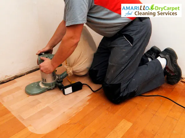 https://amarillodrycarpetcleaning.com/wp-content/uploads/2025/09/Professional-technician-sanding-wood-floors-as-part-of-a-wood-floor-refinishing-service-in-Amarillo-TX.webp